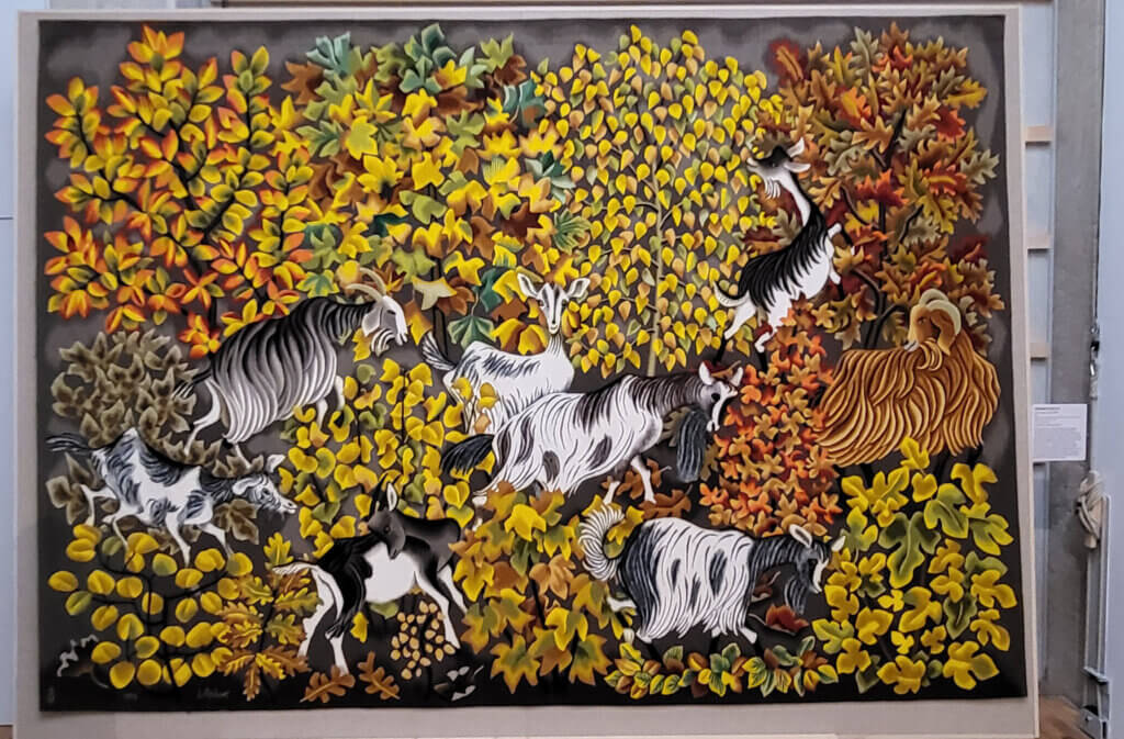 Tapisserie représentant des chèvres dans des arbres